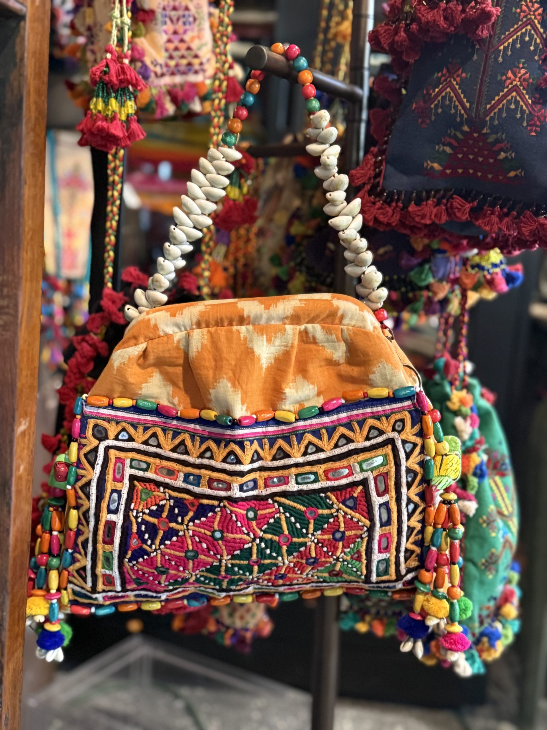 Cotton khadi patchwork purse with wooden beads, tassels and shells