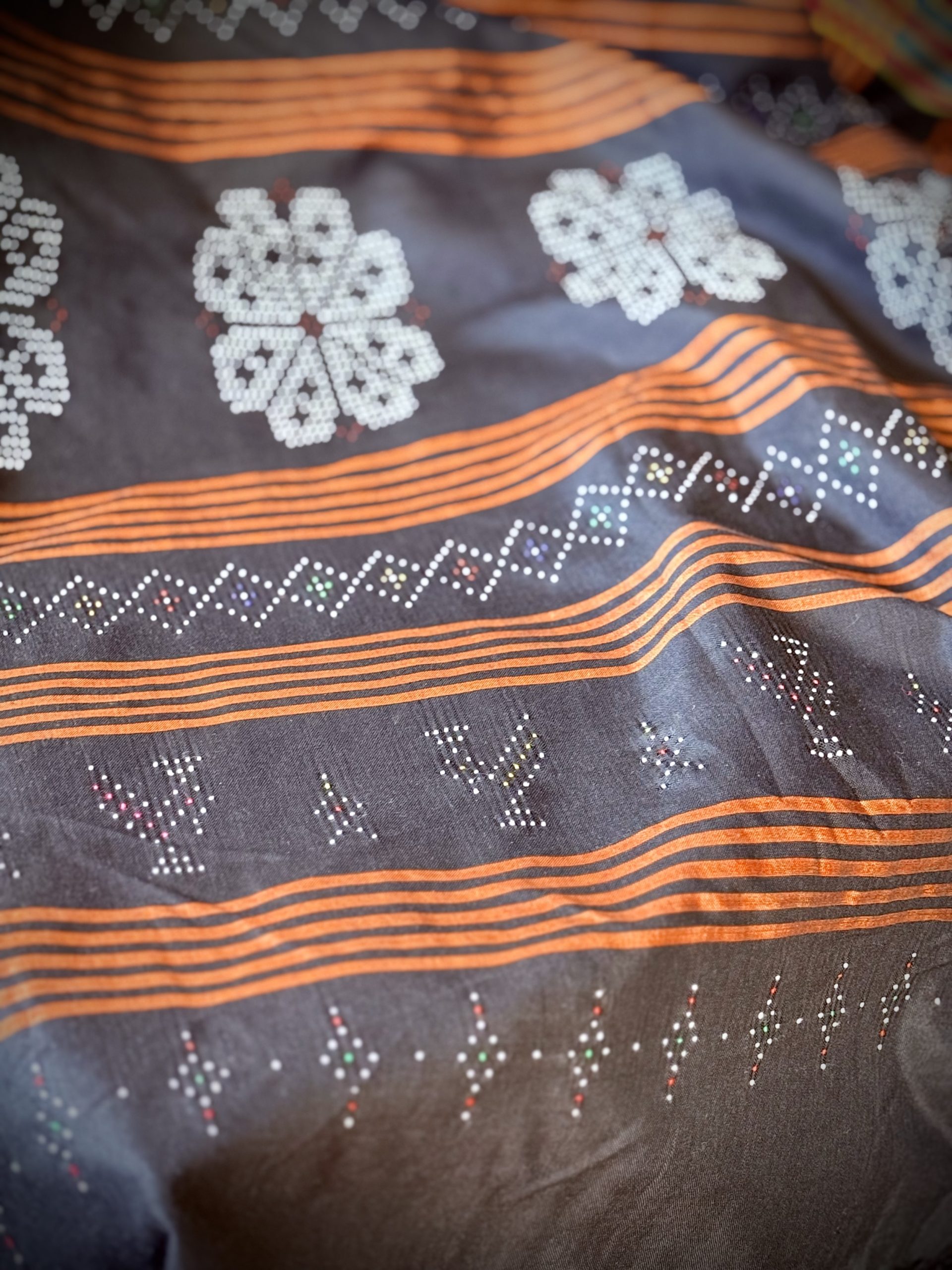 Tangaliya handwoven textile with distinctive dotted motifs