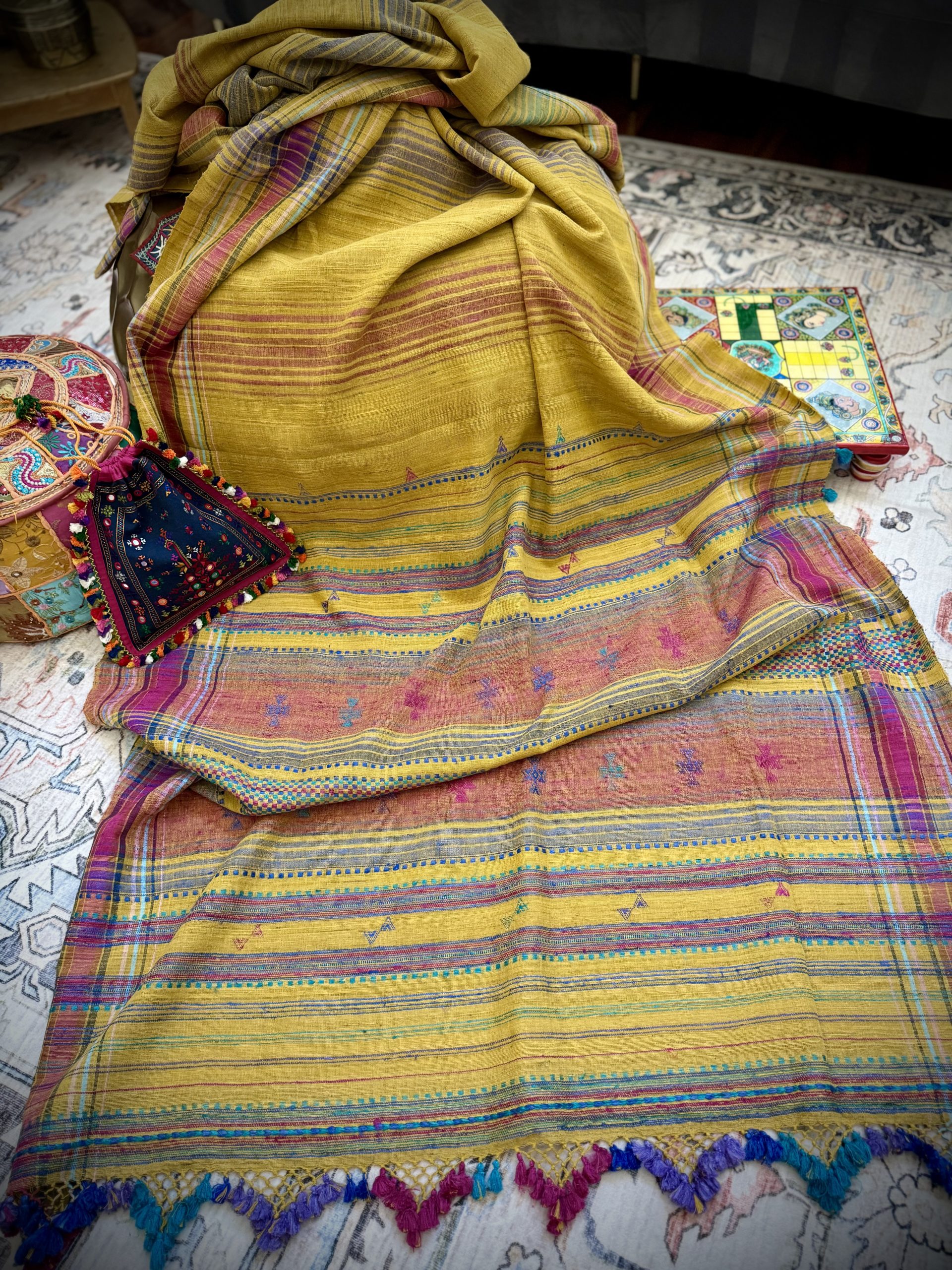 Mustard Tussar Bhujodi saree with multicolored woven border