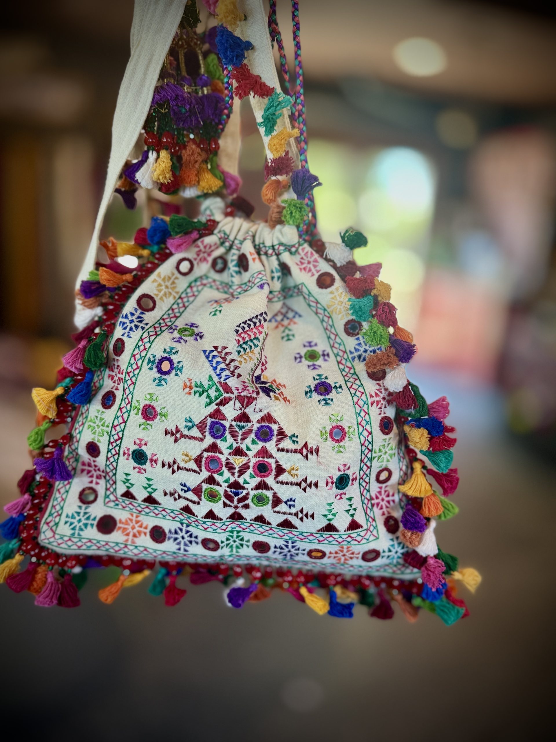 Large three-sided potli jhola with Suf embroidery, Abhla mirrors and tassels