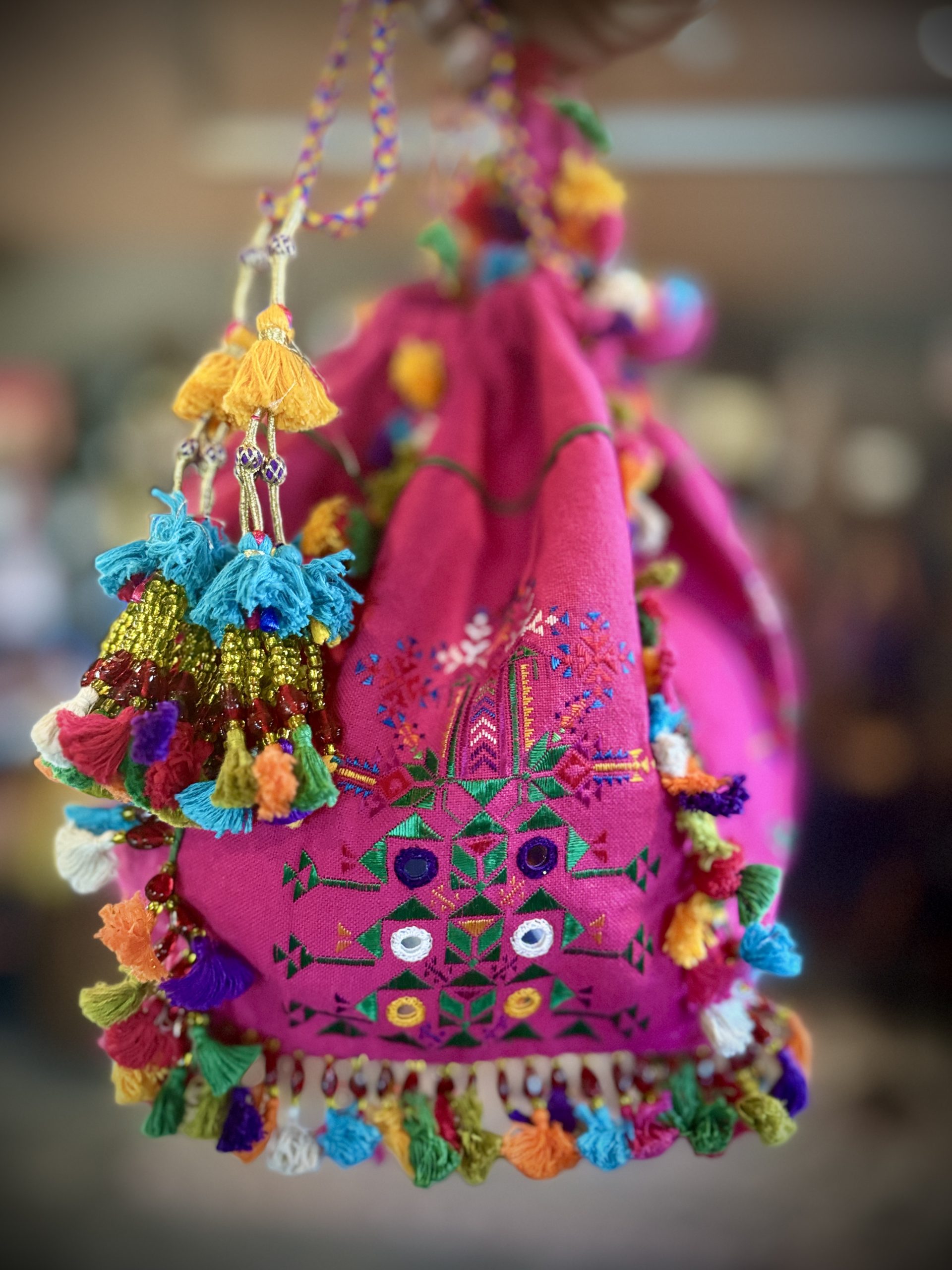 Large pink potli jhola with Suf embroidery, Abhla mirrors and tassels