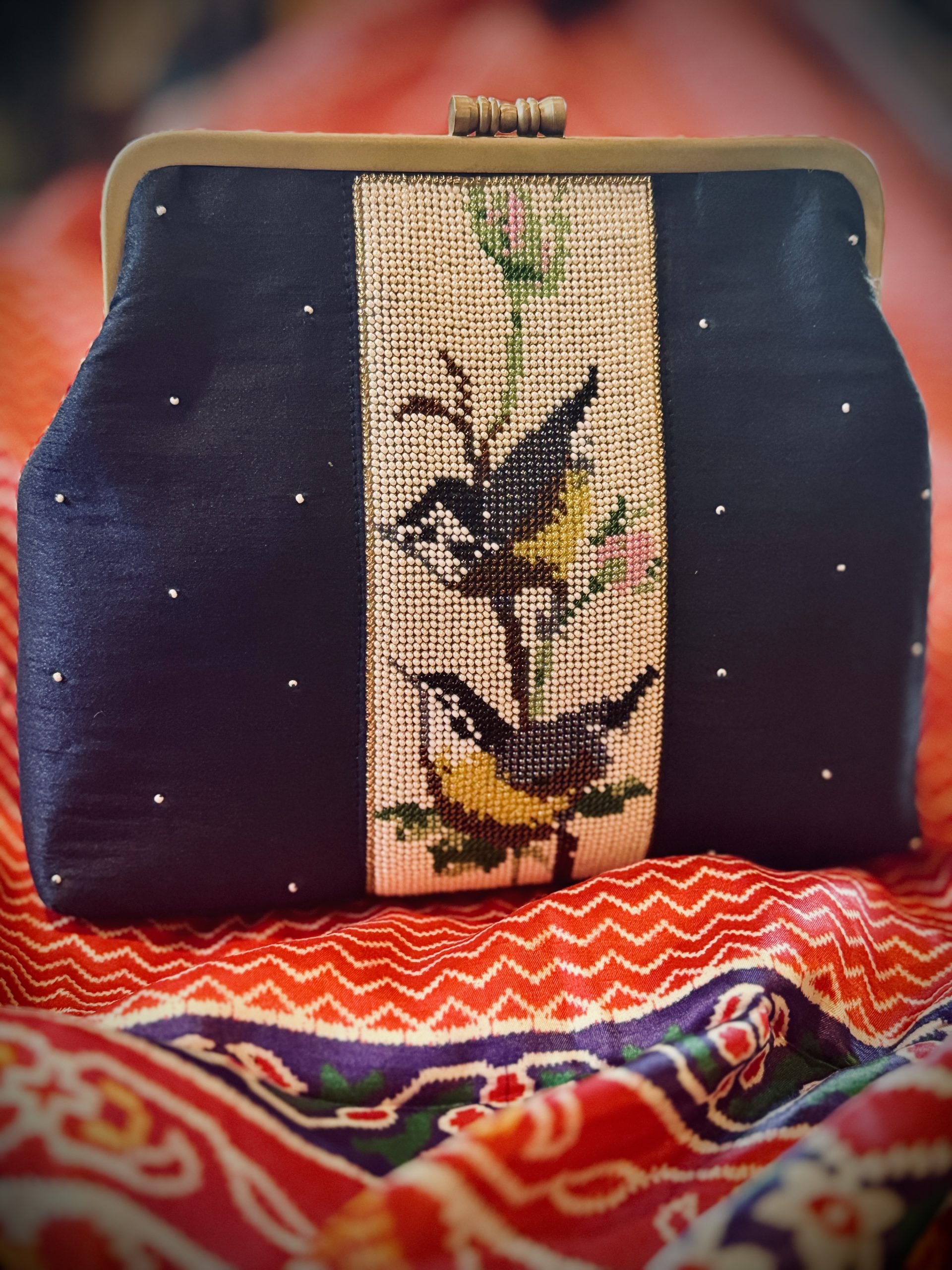 Dark-blue handloom silk purse with handmade bird-and-flower Moti work