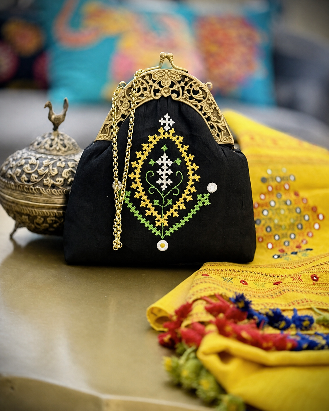 Black handcrafted embroidered handbag with vintage metal frame