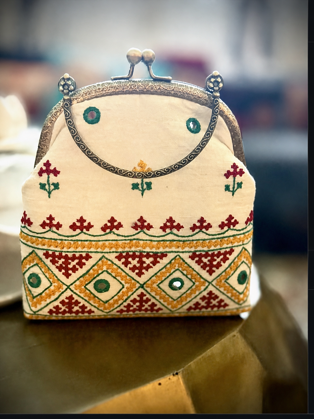 Ivory raw-silk purse with Kutchi embroidery and real mirror work