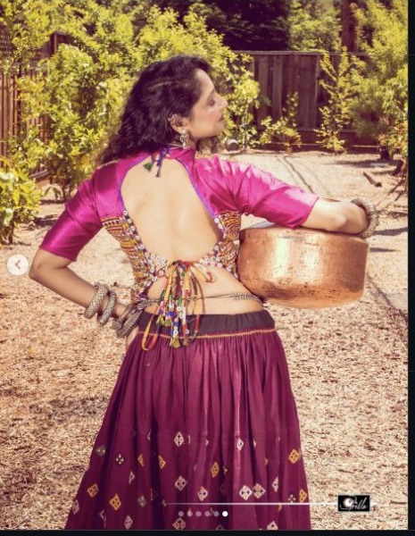 Back view of a magenta Kutch chaniya choli with handcrafted details