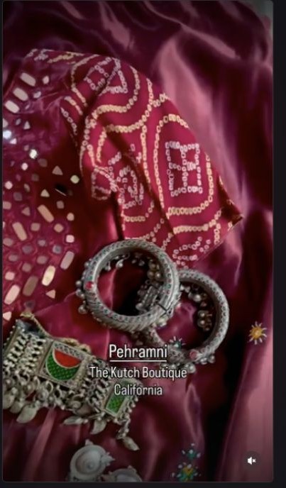 Maroon mirror-work Chaniya Choli paired with oxidised Kutch jewellery