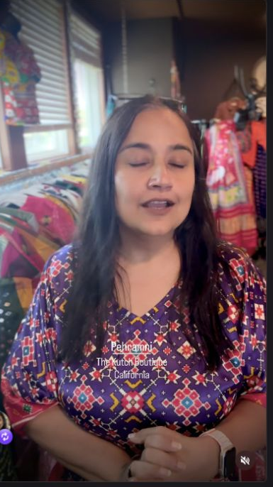 Woman wearing a colorful embroidered blouse from Pehramni’s festive collection